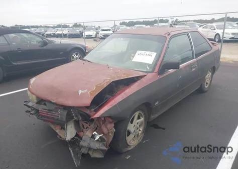 1993 Ford Escort из США, поврежденный, VIN 1FAPP10J7PW296639